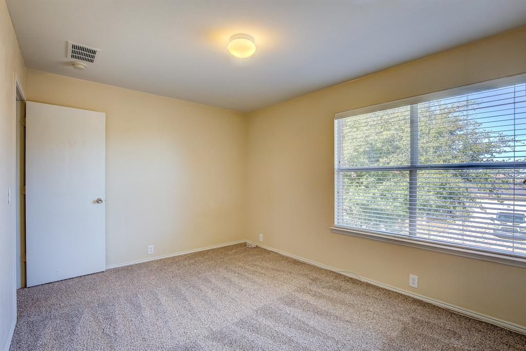 1720 Desperado Road Fort Worth, TX 76131 - Photo 35 of 40 an empty room with a window