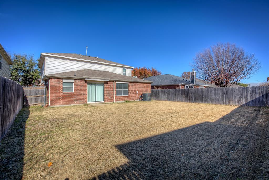1720 Desperado Road Fort Worth, TX 76131 - Photo 37 of 40 a view of a house with a yard