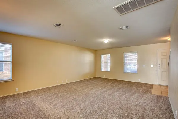 a view of an empty room with window