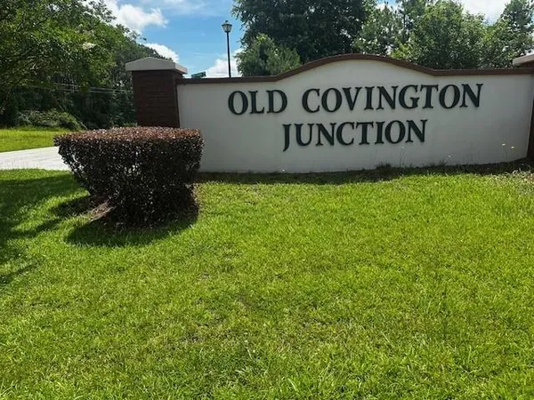 a view of outdoor space with garden and trees
