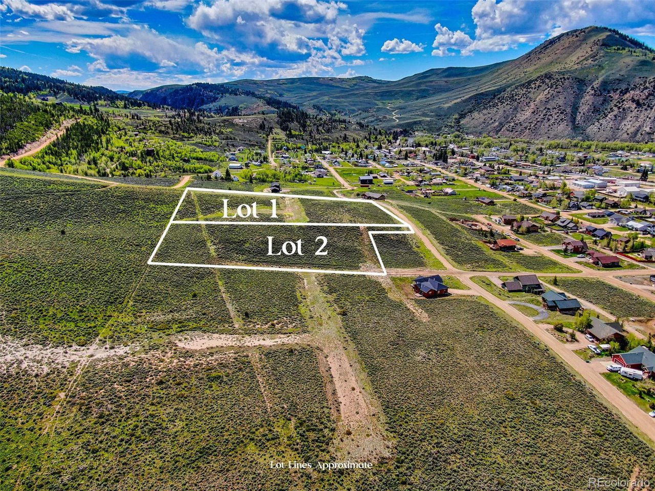 2 Ridgeway Avenue Hot Sulphur Springs, CO 80451 - Photo 8 of 24 a view of a tennis ground with a small barn