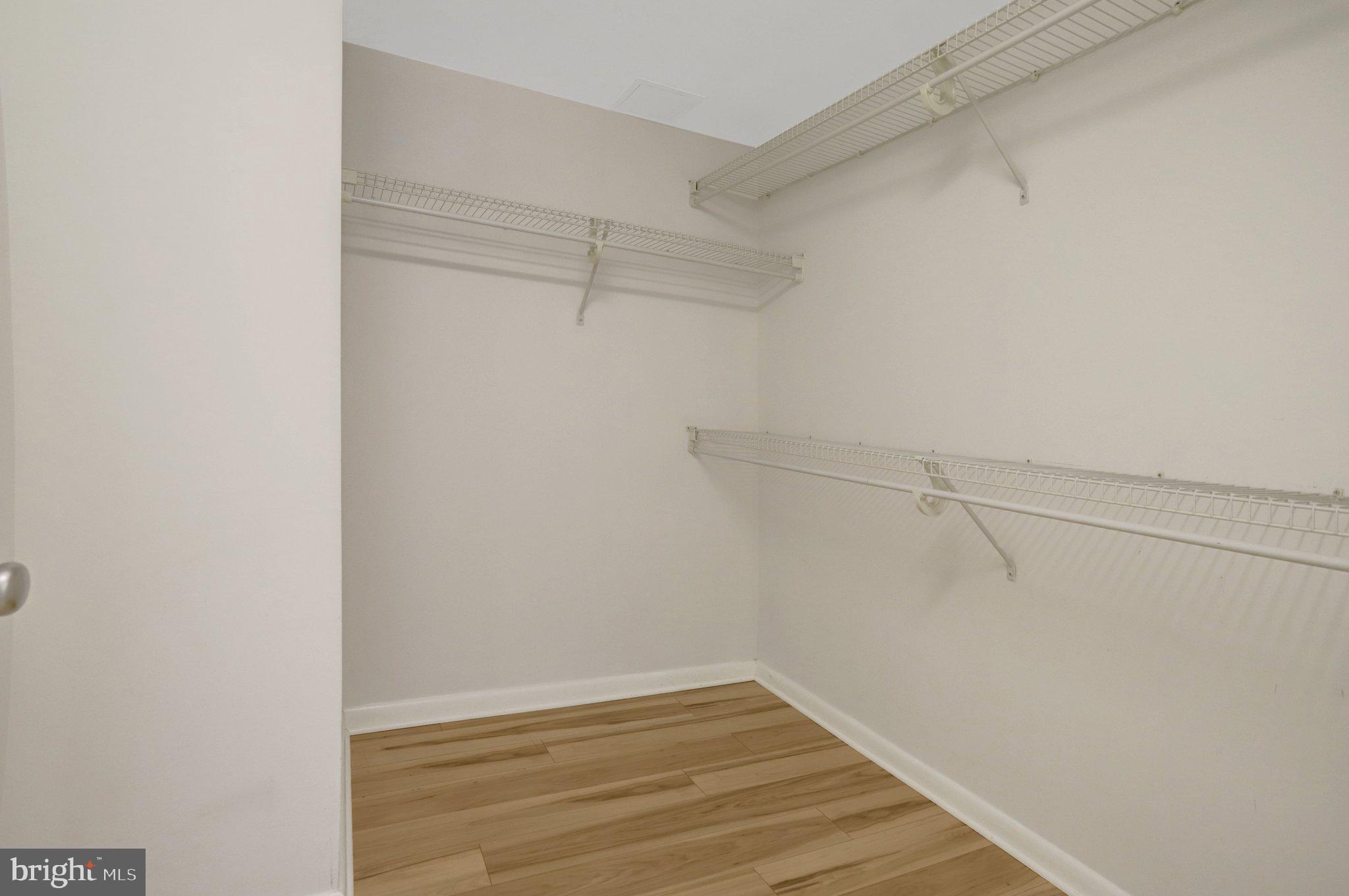 851 North Glebe Road, Unit 812 Arlington, VA 22203 - Photo 20 of 38 a view of an empty walk in closet