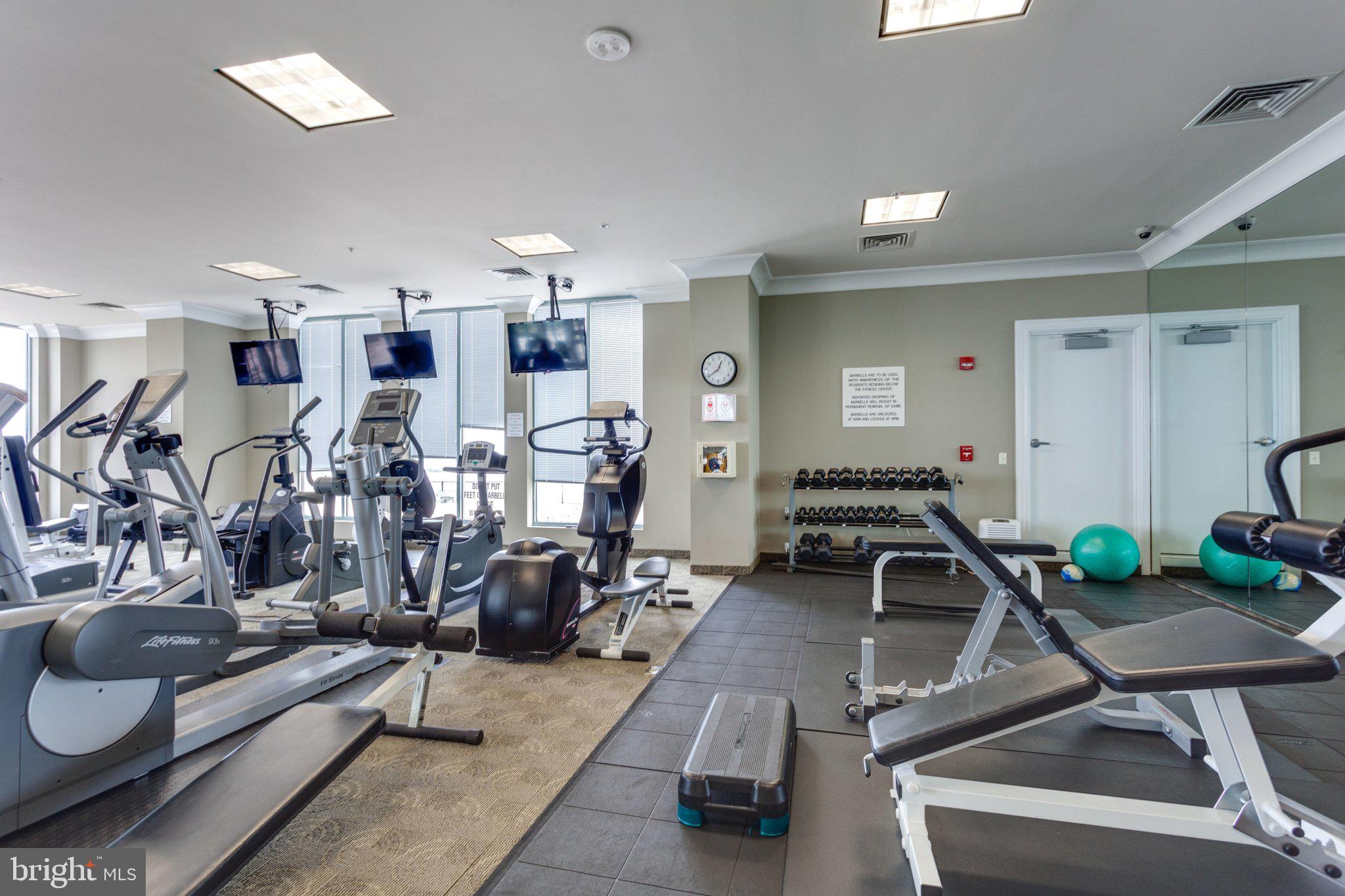 851 North Glebe Road, Unit 812 Arlington, VA 22203 - Photo 28 of 38 a view of a room with gym equipment