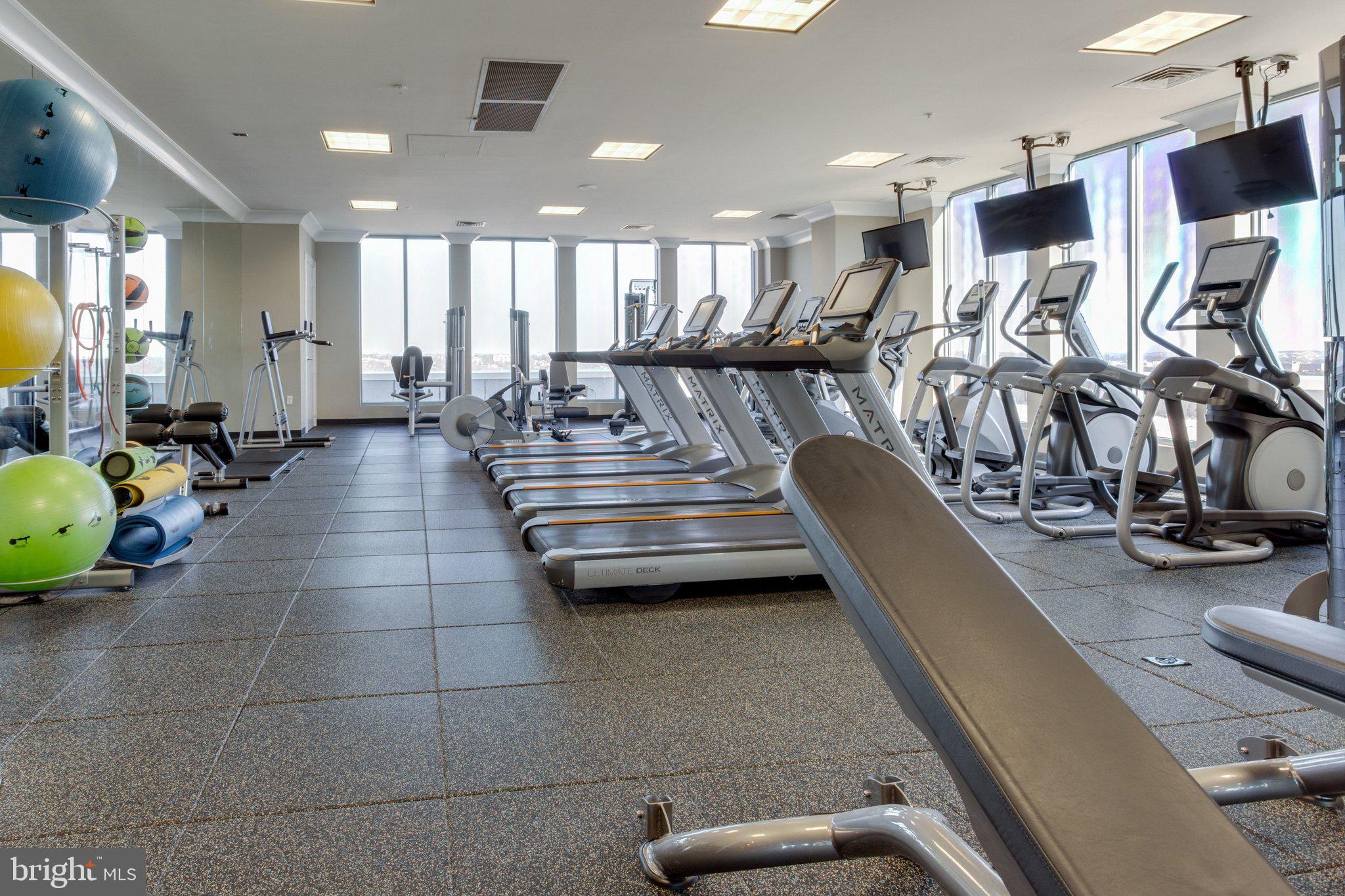 851 North Glebe Road, Unit 812 Arlington, VA 22203 - Photo 29 of 38 a view of a room with gym equipment