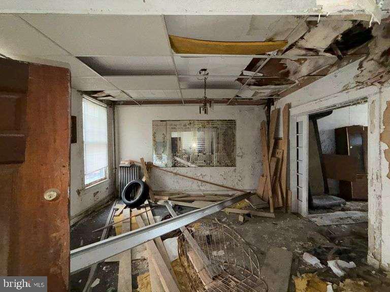 3923 Ridgewood Avenue Baltimore, MD 21215 - Photo 6 of 18 a room with gym equipment