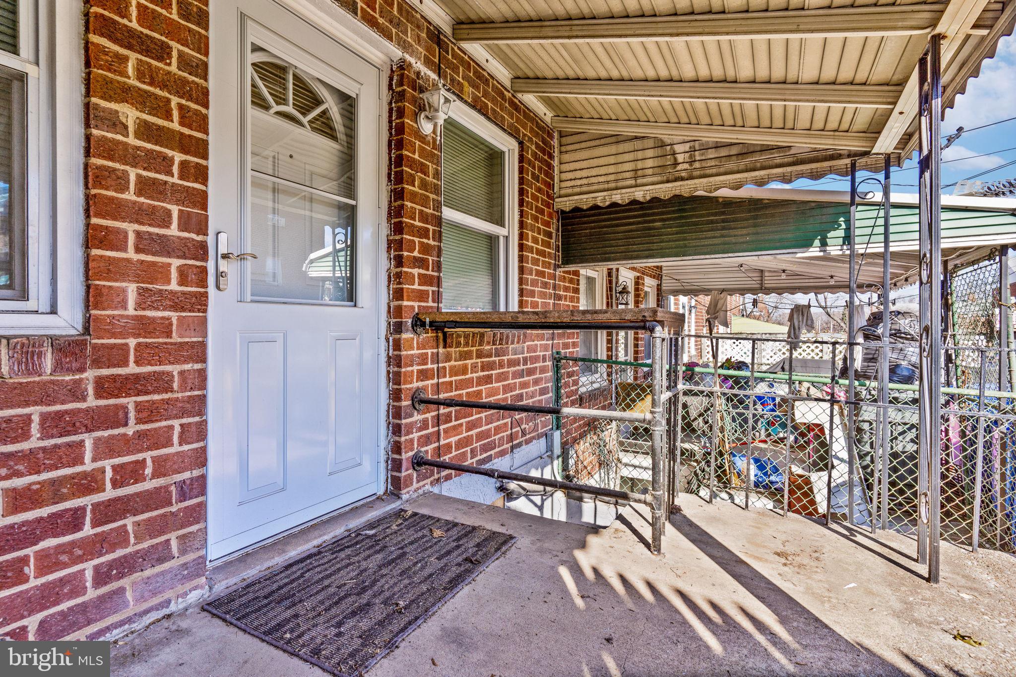 3111 Georgetown Road Baltimore, MD 21230 - Photo 11 of 39 back yard patio - stair well to basement back door