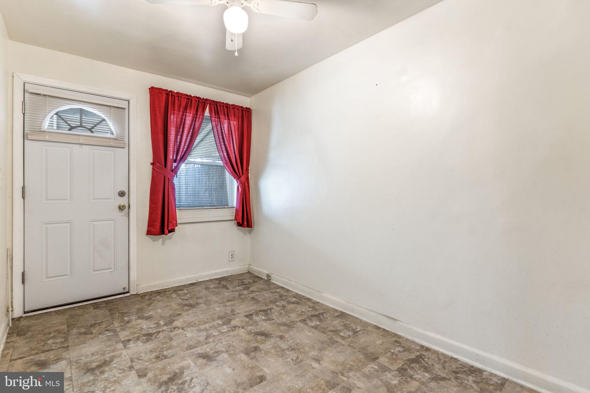 3111 Georgetown Road Baltimore, MD 21230 - Photo 18 of 39 dining room, carpeted, with ceiling fan
