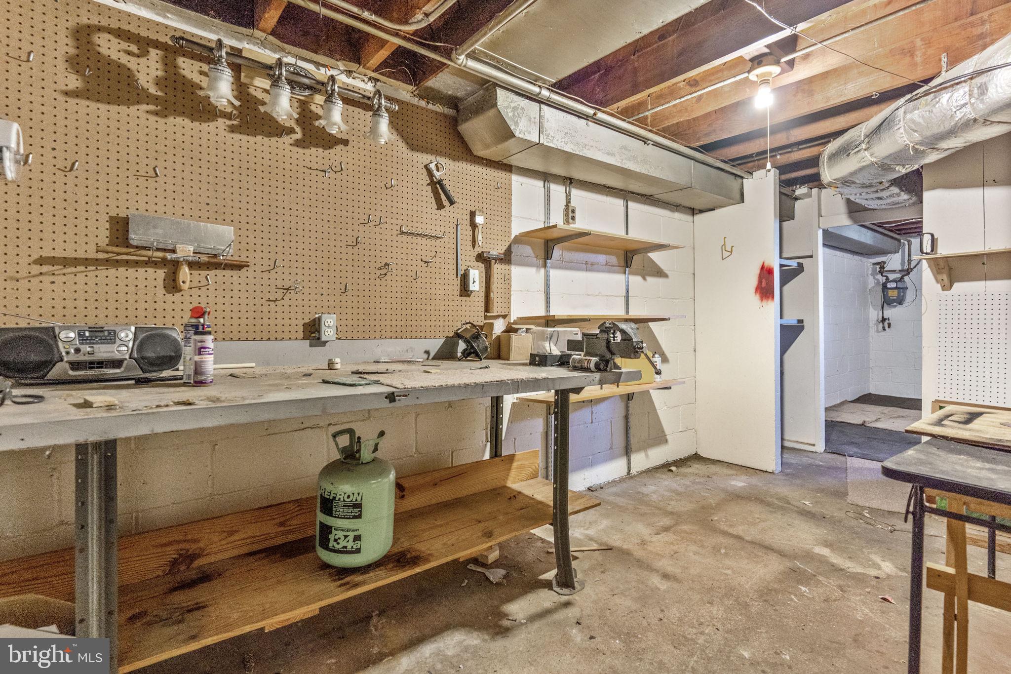 3111 Georgetown Road Baltimore, MD 21230 - Photo 34 of 39 workshop in basement utility room