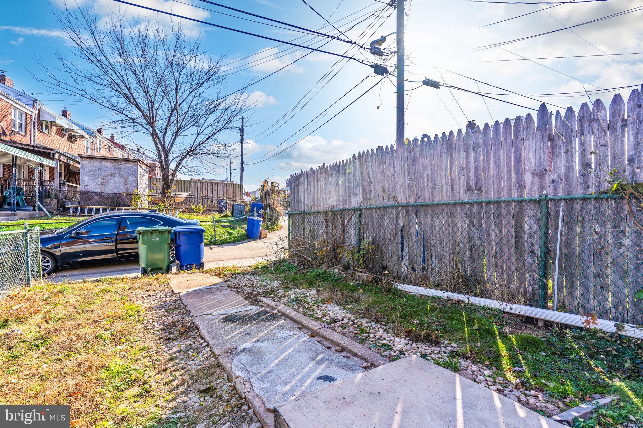 3111 Georgetown Road Baltimore, MD 21230 - Photo 39 of 39 sidewalk to alley, partially fenced rear yard