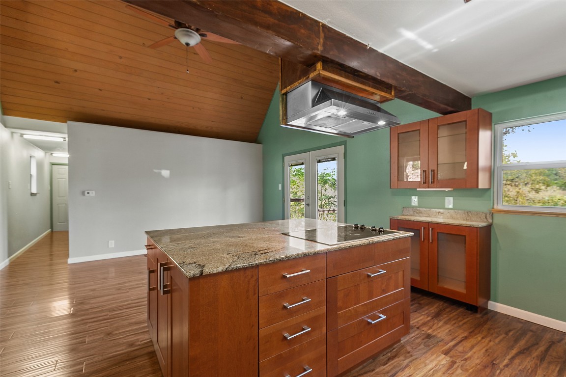 4301 Stearn's Lane Austin, TX 78745 - Photo 17 of 39 a kitchen with granite countertop a sink and cabinets