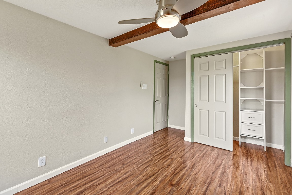 4301 Stearn's Lane Austin, TX 78745 - Photo 22 of 39 wooden floor in an empty room with a window
