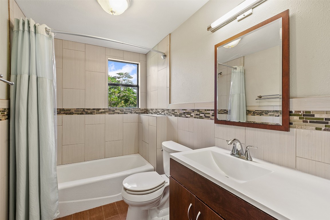4301 Stearn's Lane Austin, TX 78745 - Photo 26 of 39 a bathroom with a sink and a mirror
