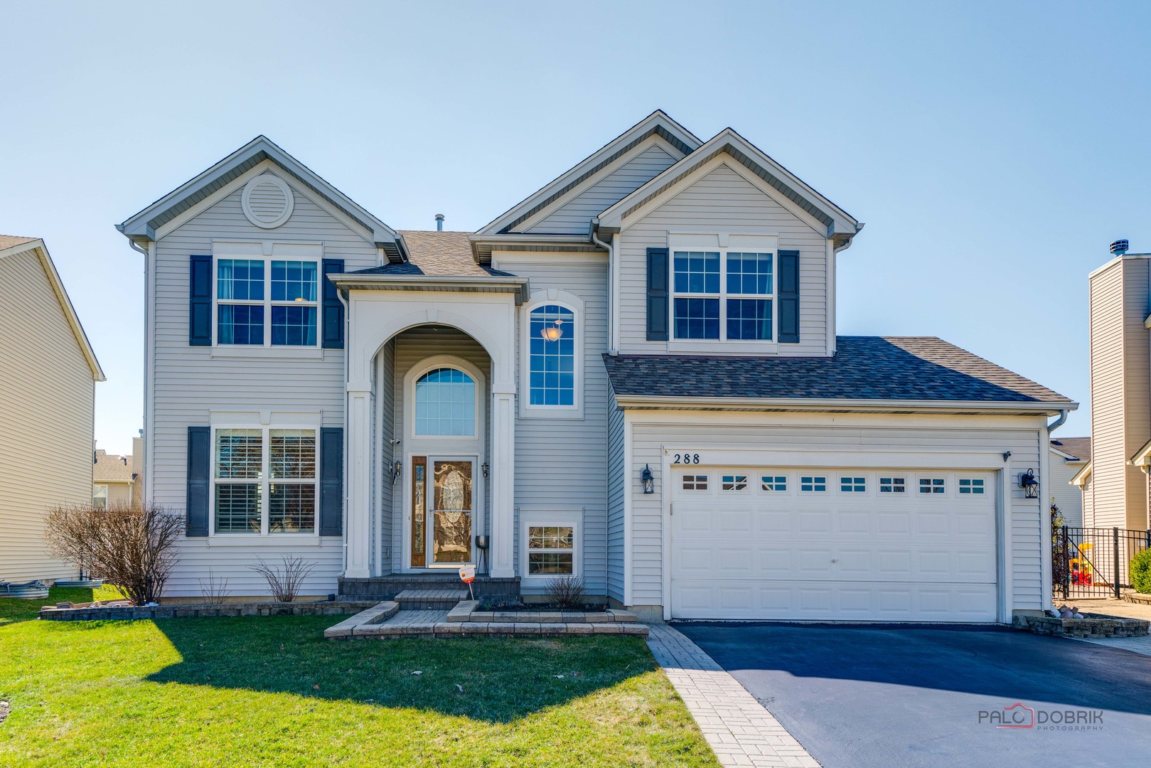 288 Shelbourne Road Volo, IL 60073 - Photo 1 of 33 a front view of a house with a yard