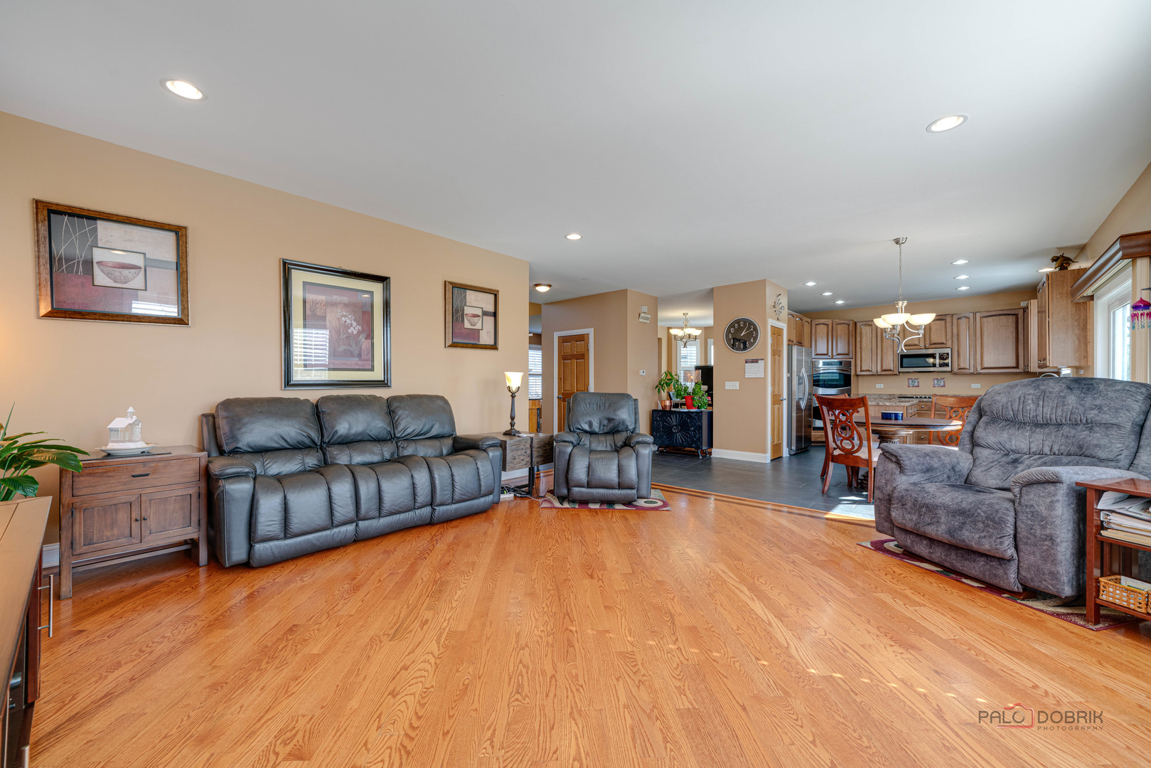 288 Shelbourne Road Volo, IL 60073 - Photo 13 of 33 a living room with furniture and a wooden floor