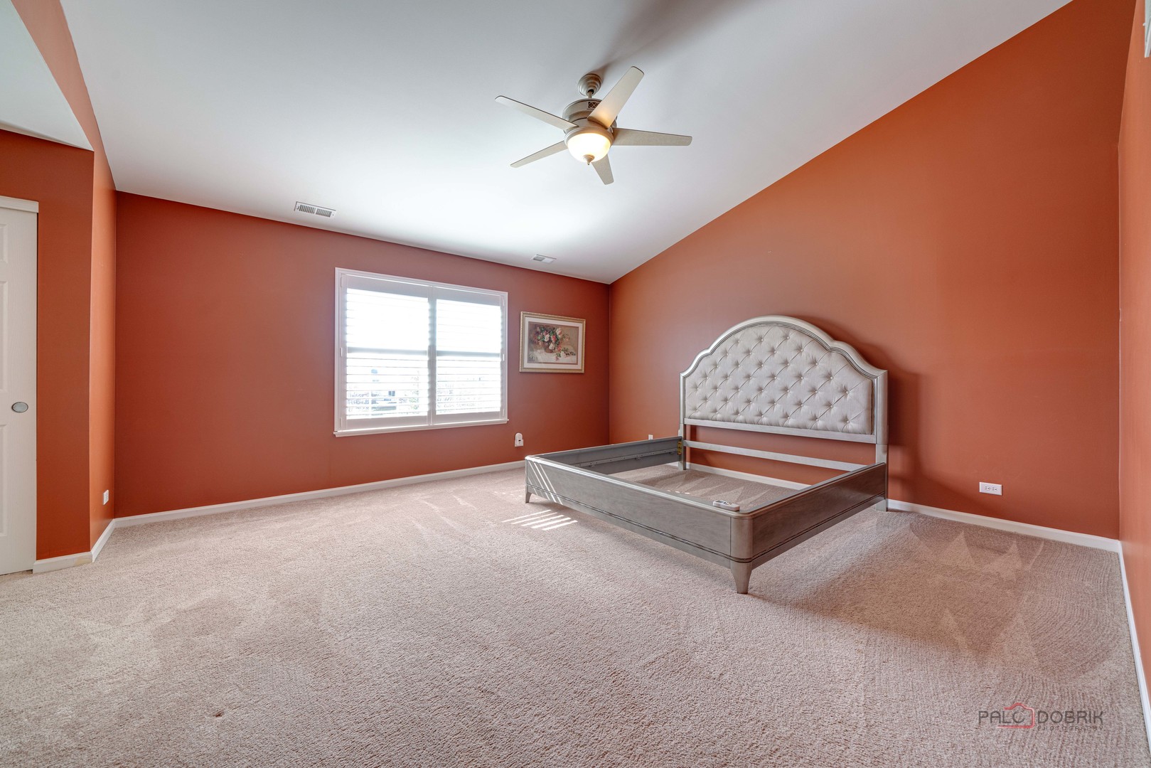288 Shelbourne Road Volo, IL 60073 - Photo 18 of 33 an empty room with windows and ceiling fan