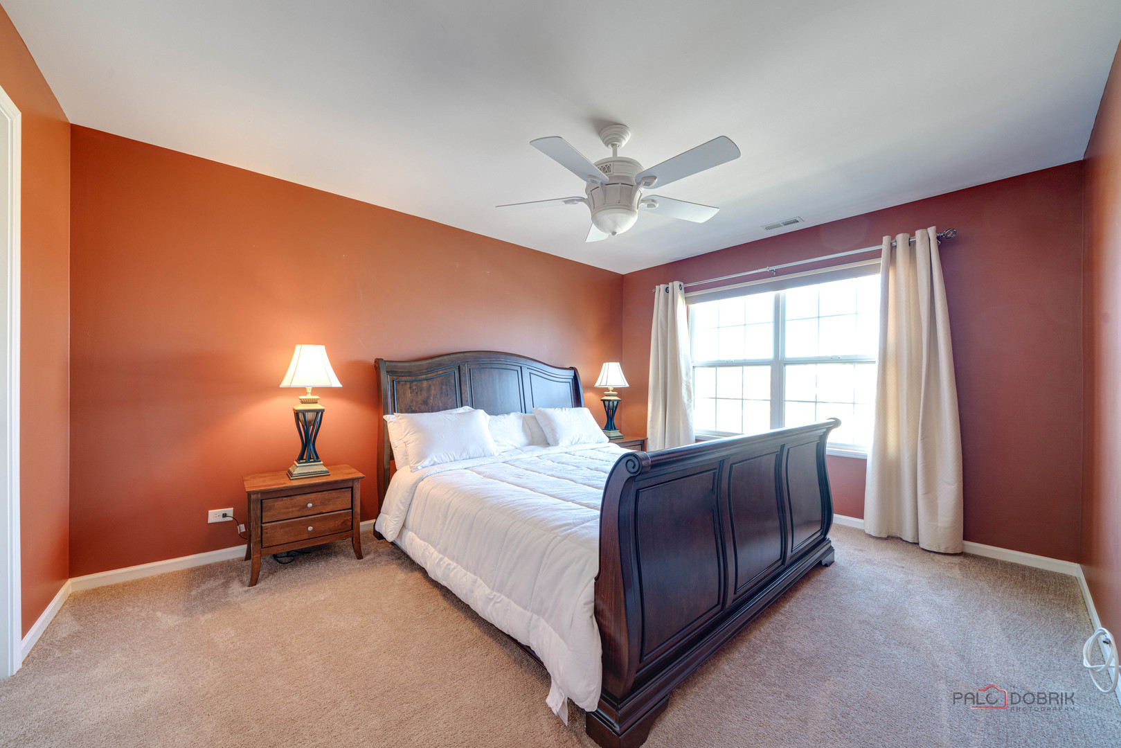 288 Shelbourne Road Volo, IL 60073 - Photo 21 of 33 a bedroom with a bed lamp and a window