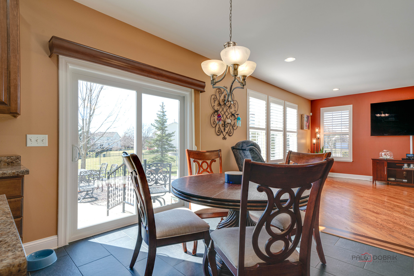 288 Shelbourne Road Volo, IL 60073 - Photo 9 of 33 a view of a dining room with furniture window and wooden floor