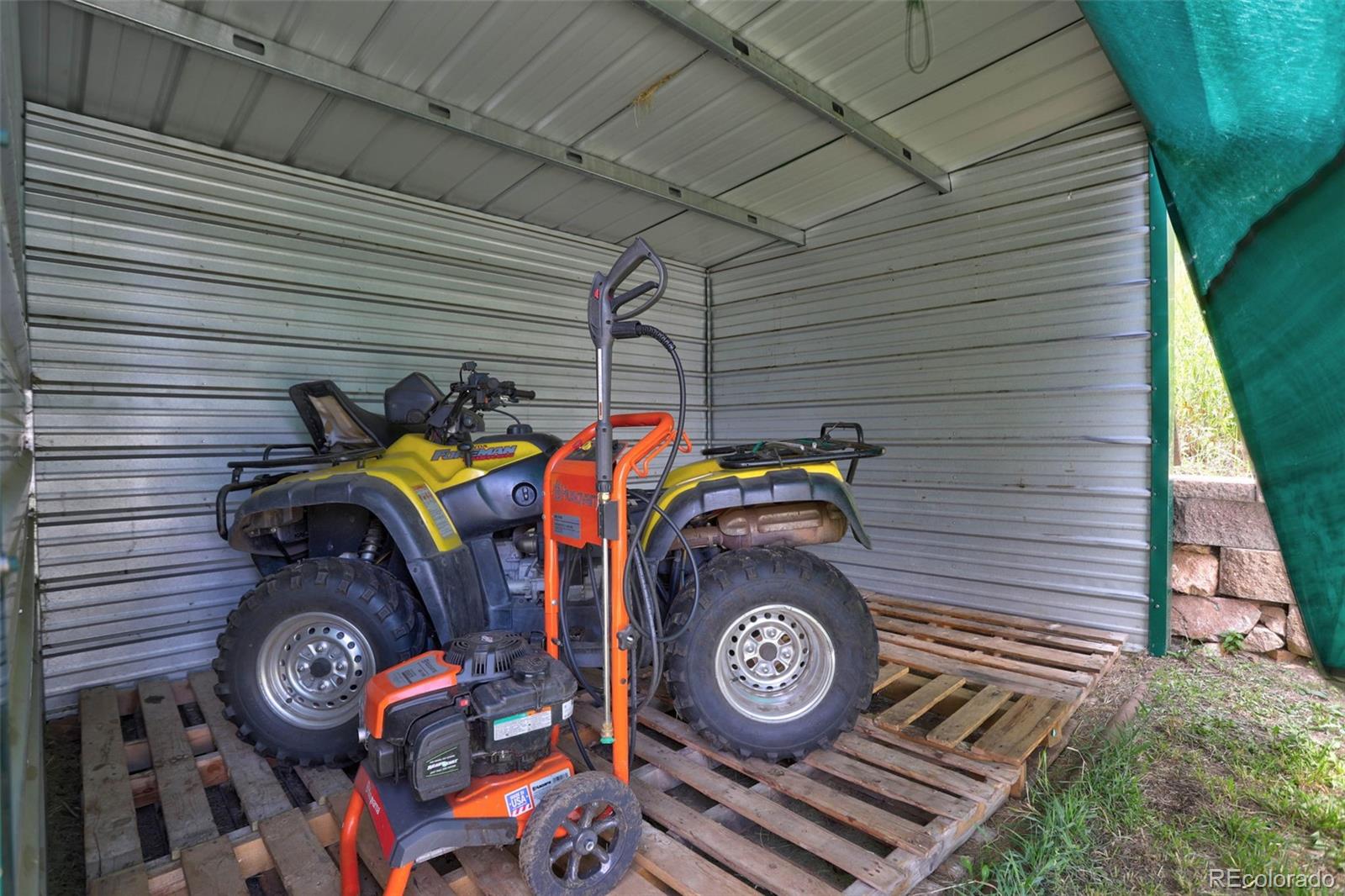 12079 Tecumseh Trail Conifer, CO 80433 - Photo 32 of 38 a view of outdoor space and wooden deck
