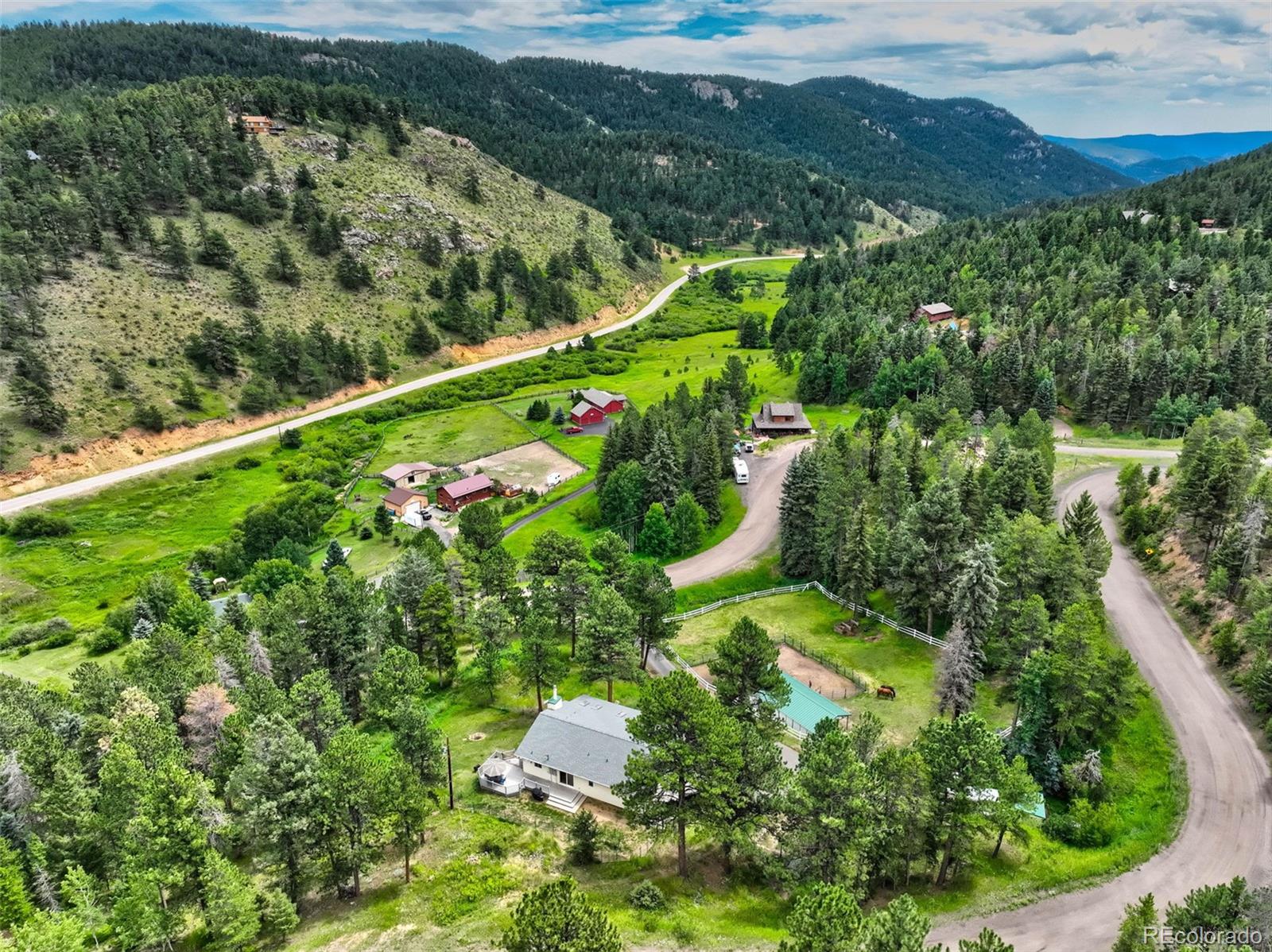12079 Tecumseh Trail Conifer, CO 80433 - Photo 38 of 38 a view of a city with lush green forest