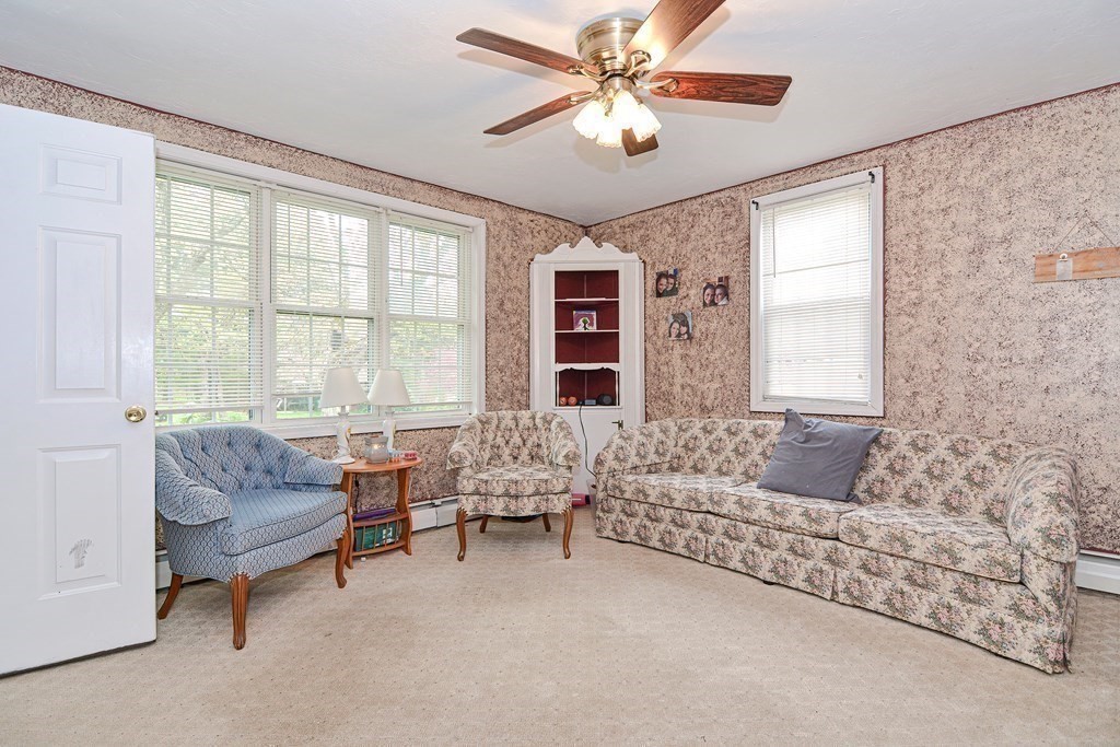 34 South Spencer Road Spencer, MA 01562 - Photo 17 of 34 a living room with furniture and a large window