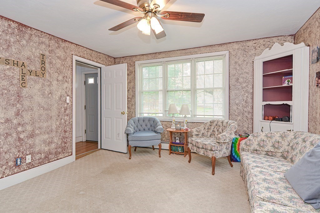 34 South Spencer Road Spencer, MA 01562 - Photo 18 of 34 a living room with furniture and a window