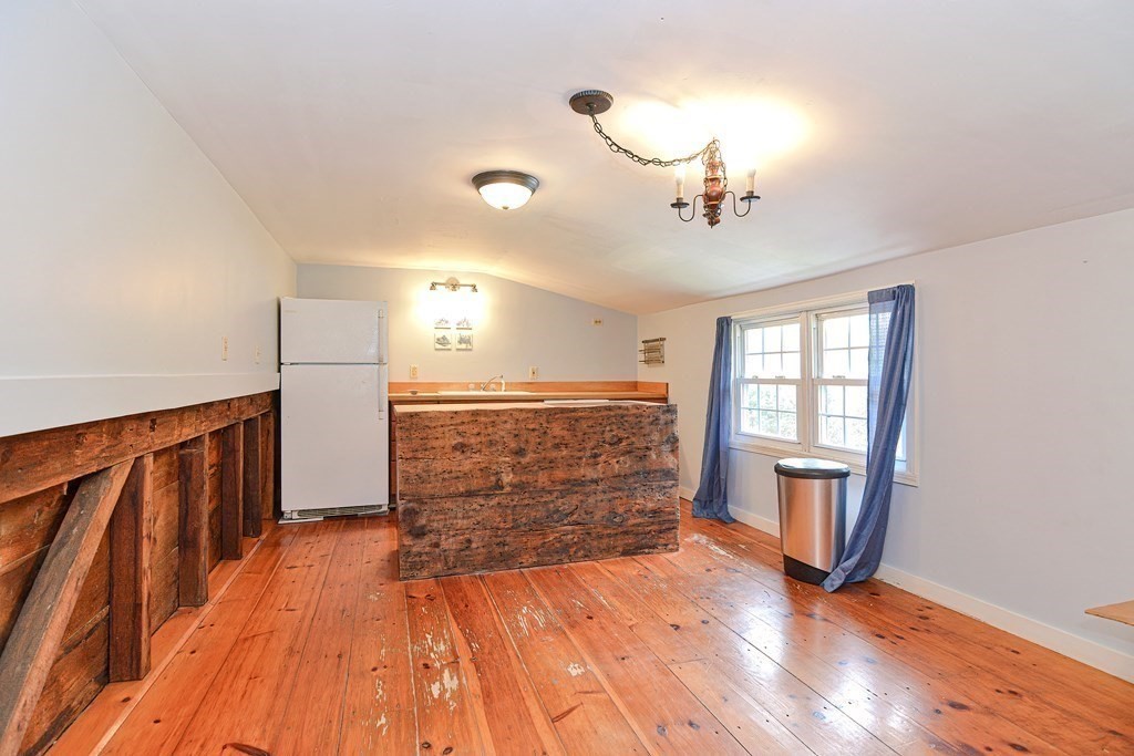 34 South Spencer Road Spencer, MA 01562 - Photo 21 of 34 a view of empty room with wooden floor and fan