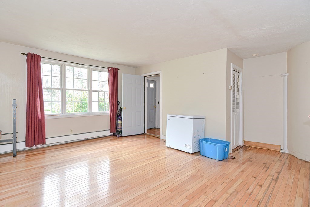 34 South Spencer Road Spencer, MA 01562 - Photo 23 of 34 a view of an empty room with wooden floor and a window
