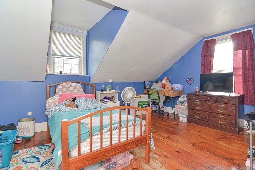 34 South Spencer Road Spencer, MA 01562 - Photo 25 of 34 a bedroom with furniture a baby crib and a dresser