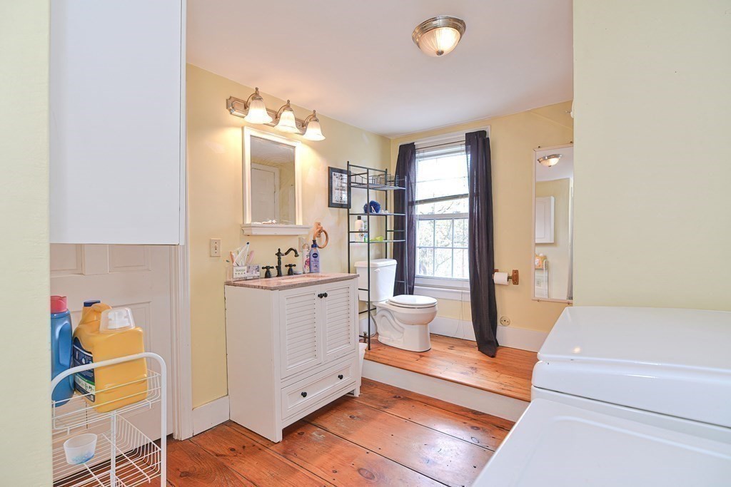 34 South Spencer Road Spencer, MA 01562 - Photo 27 of 34 a spacious bathroom with a double vanity sink a mirror and a bathtub