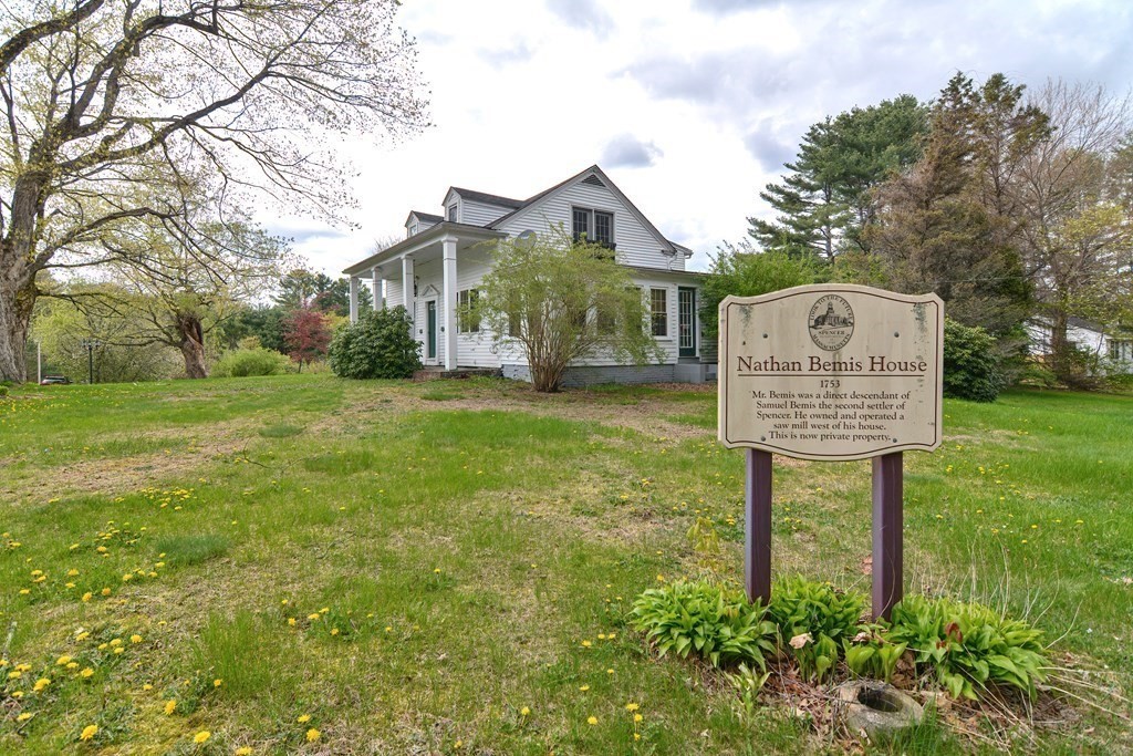 34 South Spencer Road Spencer, MA 01562 - Photo 29 of 34 a front view of a house with garden