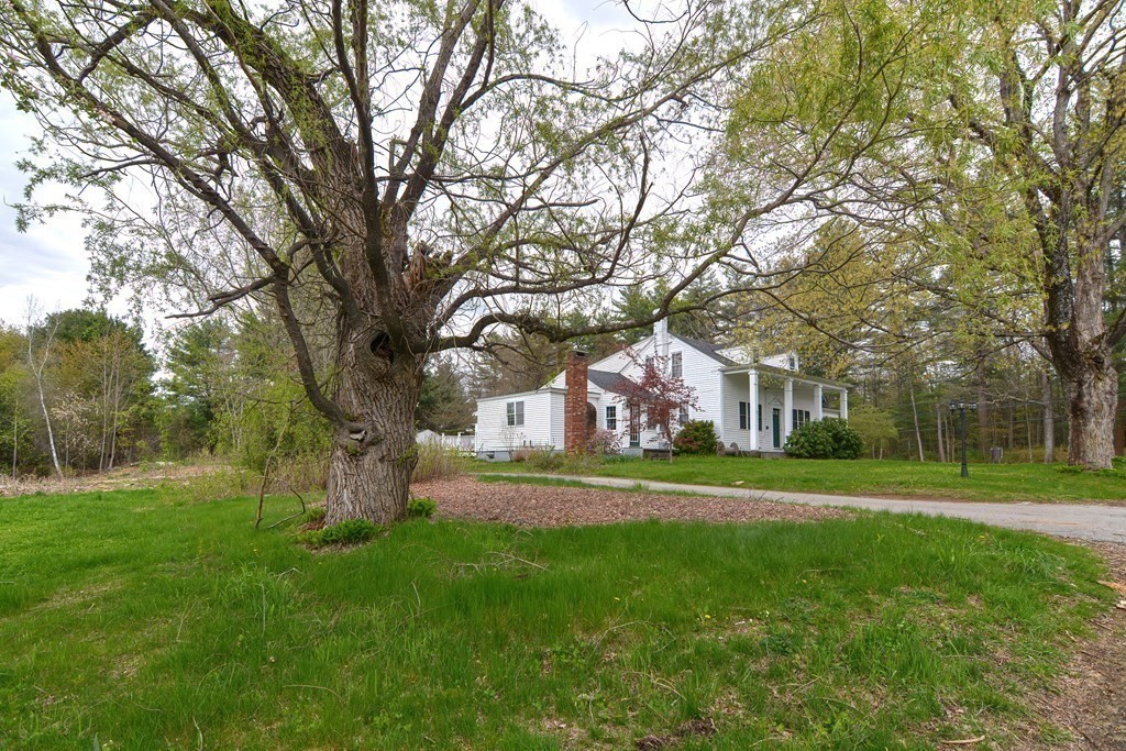 34 South Spencer Road Spencer, MA 01562 - Photo 34 of 34 a view of a big yard in front of a house