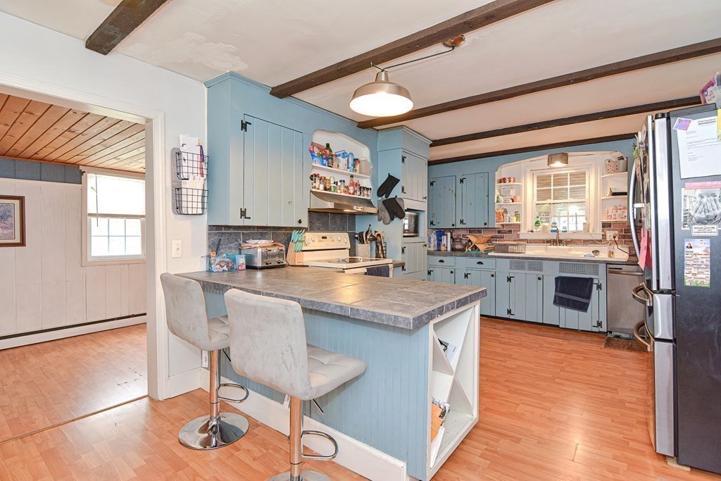 34 South Spencer Road Spencer, MA 01562 - Photo 5 of 34 a kitchen with a sink cabinets and window