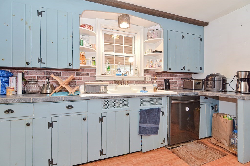 34 South Spencer Road Spencer, MA 01562 - Photo 8 of 34 a kitchen with stainless steel appliances granite countertop a sink stove and cabinets