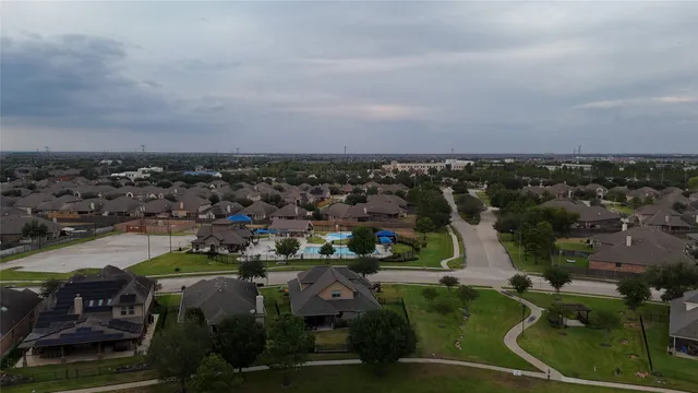 an aerial view of a city with lots of residential buildings