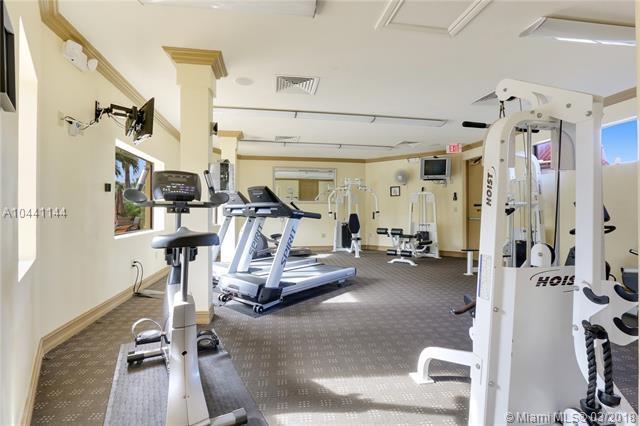 100 Uno Lago Drive, Unit 205 Juno Beach, FL 33408 - Photo 13 of 13 a view of a room with gym equipment