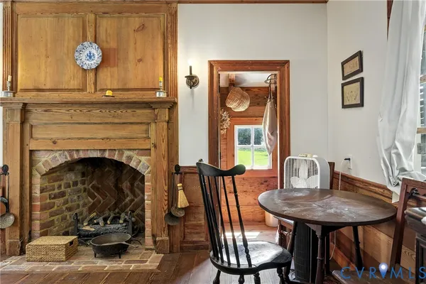 a bedroom with furniture and a chair