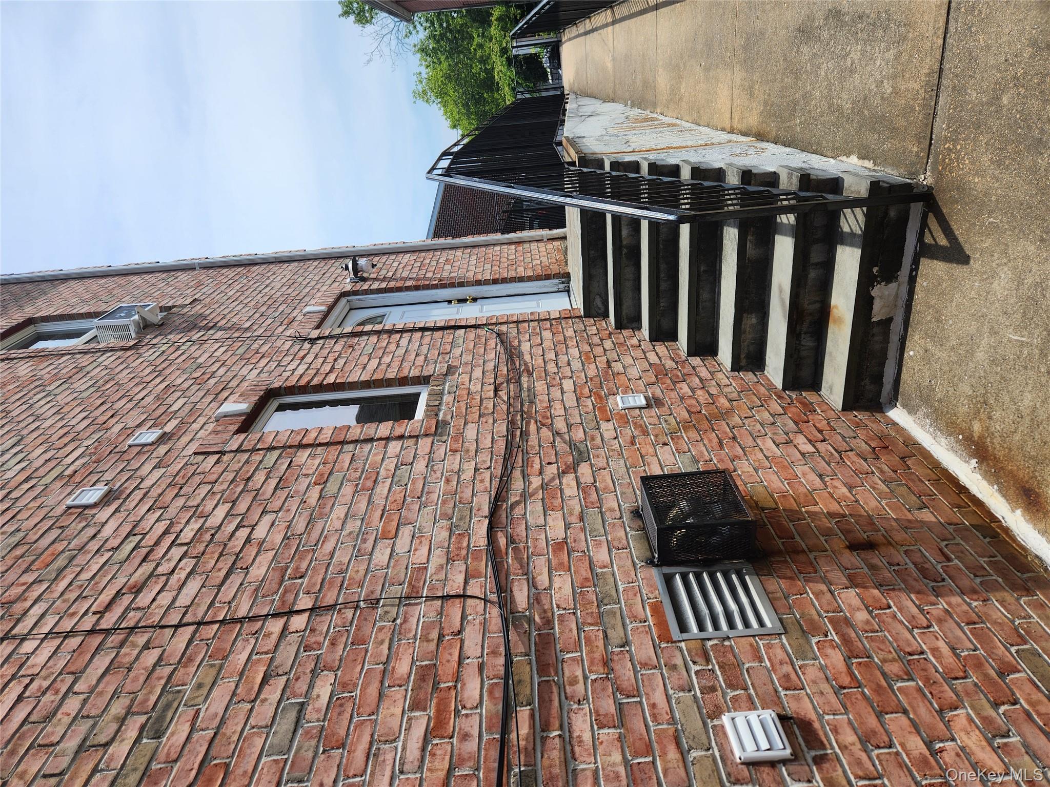 199-04 47th Avenue Queens, NY 11358 - Photo 3 of 5 a view of entryway