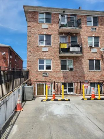 a front view of building with large windows
