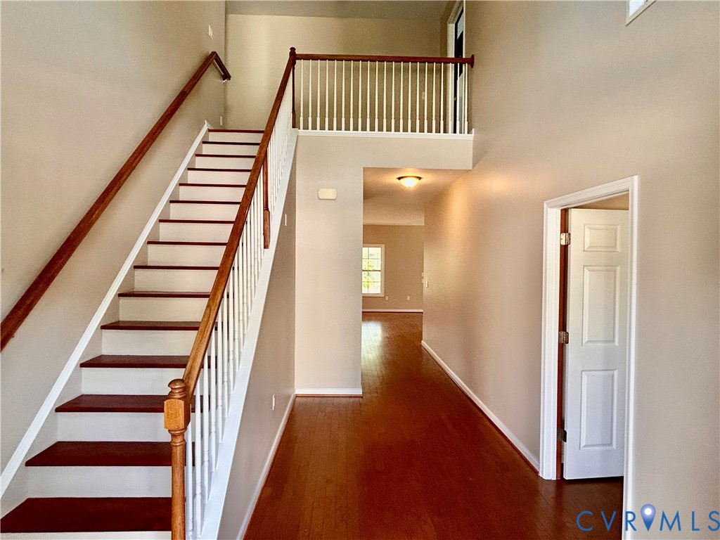 14537 Parracombe Lane Midlothian, VA 23112 - Photo 11 of 50 a view of a hallway with staircase and white walls