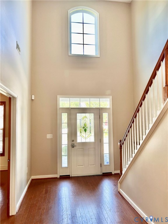 14537 Parracombe Lane Midlothian, VA 23112 - Photo 12 of 50 a view of an entryway with wooden floor and windows