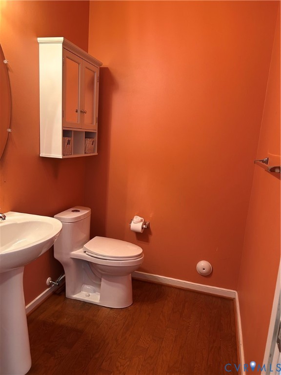 14537 Parracombe Lane Midlothian, VA 23112 - Photo 18 of 50 a bathroom with a toilet a sink and mirror