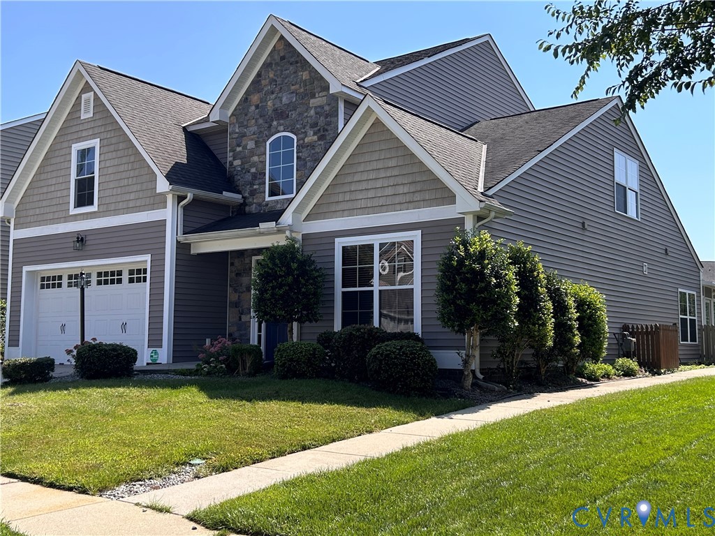 14537 Parracombe Lane Midlothian, VA 23112 - Photo 2 of 50 a front view of a house with a yard
