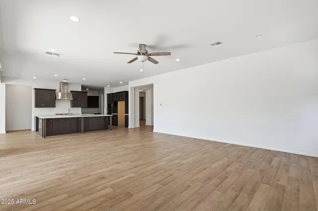 a kitchen with a stove and a refrigerator