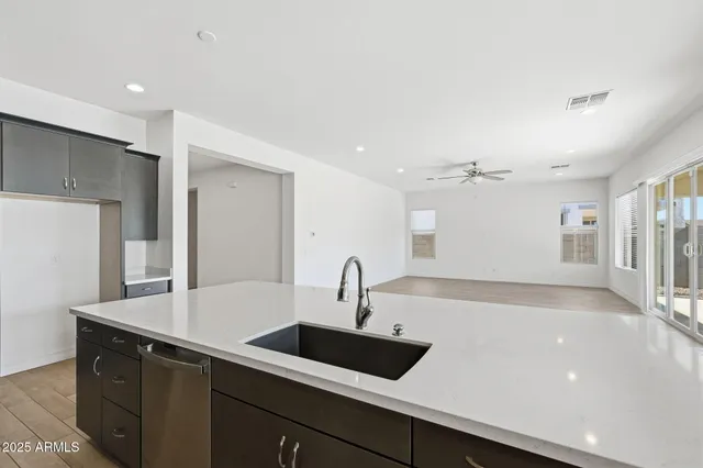 a view of room with ceiling fan