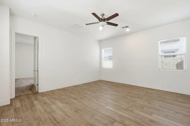 a backyard of a house with lots of green space