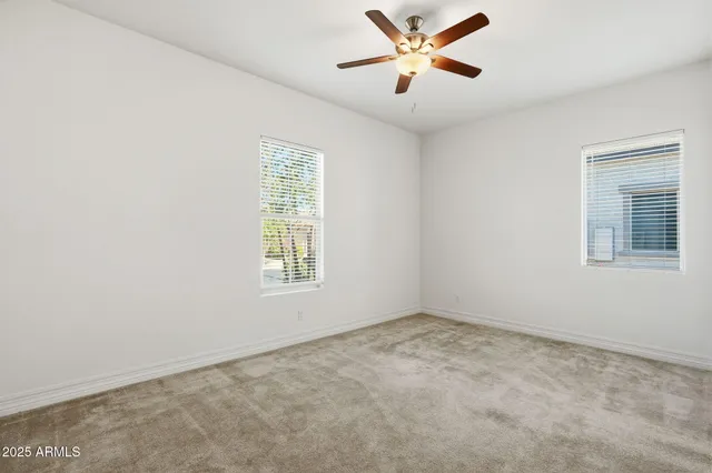 a view of a golf course with a lake view