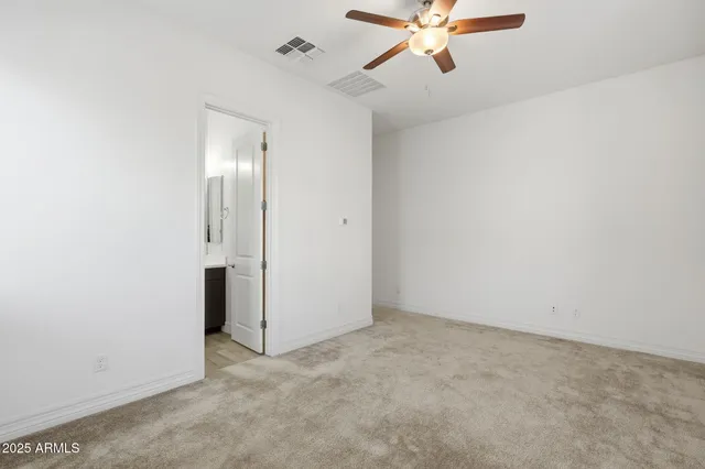 a view of a golf course with a lake view