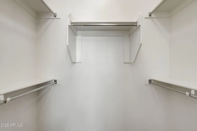 a view of a house with swimming pool and sitting area