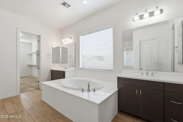 an aerial view of a house with a garden