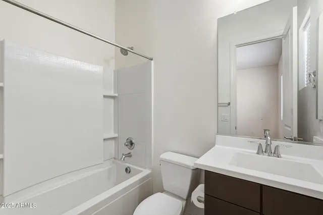 an aerial view of a house with a ocean view